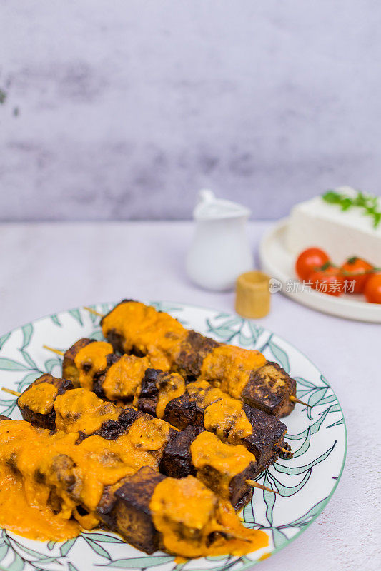 Baked marinated tofu.  Vegan Skewers.